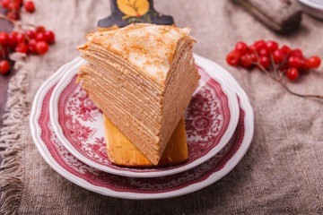 Layered cake made of pancakes.Shrovetide,a traditional Russian holiday.selective focus.