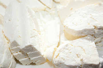 Closeup of paneer cut into pieces on buttercloth