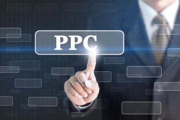 Businessman pressing PPC concept button. Can be used in advertising.