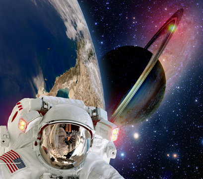 Astronaut helmet spaceman extraterrestrial saturn planet sci fi space travel. Elements of this image furnished by NASA.