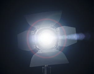 Spotlight fixture glowing used in film and theater productions  isolated on black background
