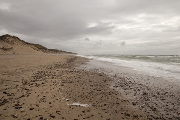 Danish Beach. One of the stretches of beach on the Thy National Park, the beach is raked steeply and with the coming storm the North Sea looks wild. 