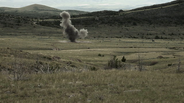 A training explosive goes off in a far field
