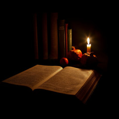 Reading by candlelight