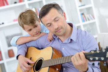 man playing guitar