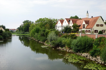 Fototapeta na wymiar DONAUWORTH, GERMANY - 1 SEPTEMBER 2015 Houses on the river bank