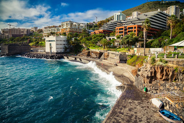 small city beach near bath complex Lido in Funchal - obrazy, fototapety, plakaty