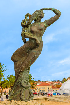 The statue of a mermaid by the sea - the symbol of the resort town of Cascais, Portugal.