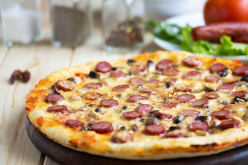 Homemade Pizza with hunter sausages