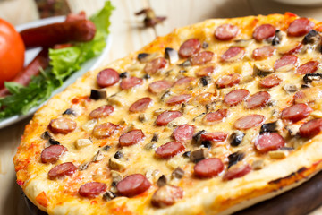 Homemade Pizza with hunter sausages