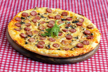 Homemade Pizza with hunter sausages