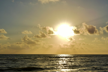 Fototapeta na wymiar The sun rise in the morning seaside beautiful