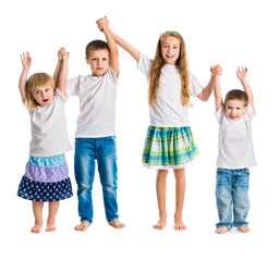 children jump holding hands