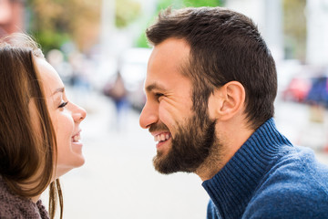 Fototapeta premium Close up .A man looks at a woman with love.they smile