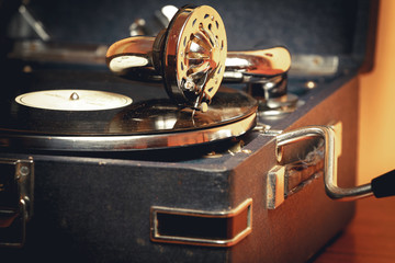 Old record player gramophone needle on record closeup. vintage toning © perfectlab
