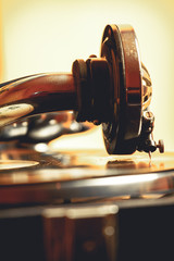 Old record player gramophone needle on record closeup. vintage toning © perfectlab