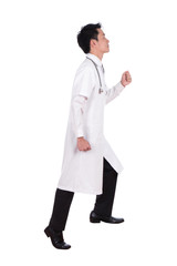 male doctor stepping up isolated on white background