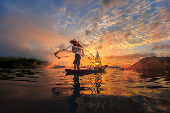 Man fishing on Mekong River, Nong Khai Province, Thailand