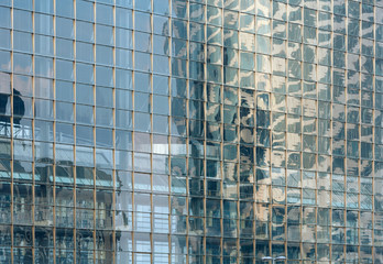Wall of skyscraper (background).