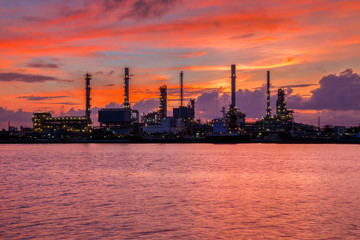 Oil refinery along the river at Dusk (Bangkok, Thailand)