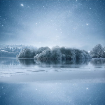 Stars at night reflected in a frozen winter lake, Shercock, County Cavan, Ireland