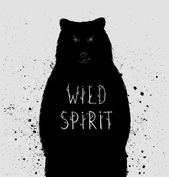 Silhouette of  bear with "wild spirit" lettering. Vector illustr