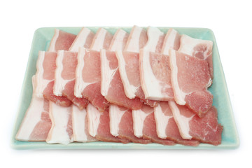 Bacon, streaky pork slice on white background