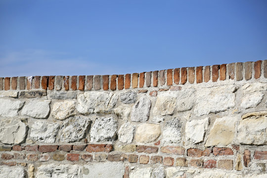 Old Big Wall Against Blue Sky With Copy Space