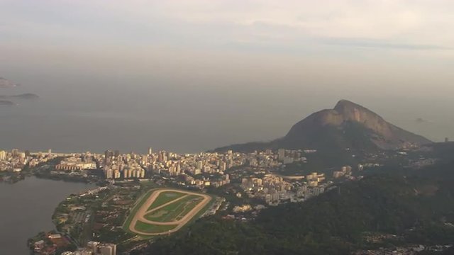 Pan of Brazilian Highlands, Rio de Janeiro, and Lagoa from a helicopter.