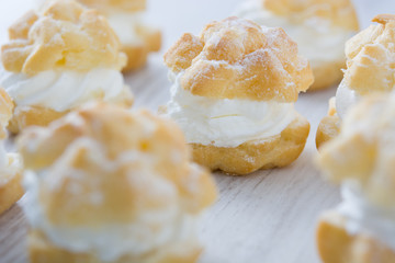 Fresh profiteroles with cream
