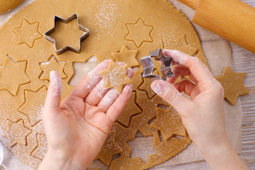 taking out Christmas cookies from the mold