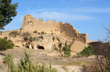 Fototapeta na wymiar Fez, Morocco - December 28: Ruins of Merinid Tombs on the hill above old medina in Fes, Morocco