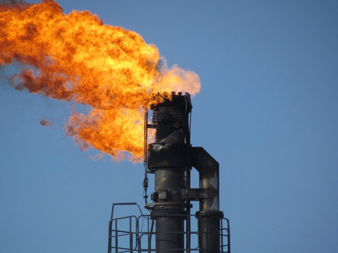 Torch system on an oil field