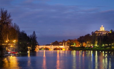 Fototapeta na wymiar Turin (Torino) night panorama on river Po at blue hour