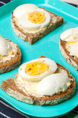 Sandwich with butter and egg.