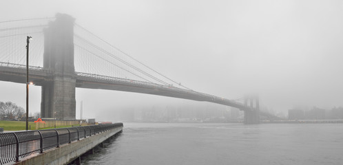 Brooklyn Bridge in a fog.