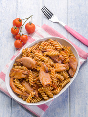 pasta with squid and  tomatoes