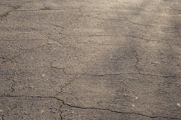 cracked asphalt road texture