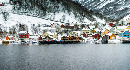  red house on a background of the rocky mountains