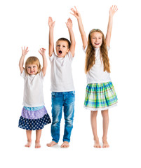 smiling children with arms up