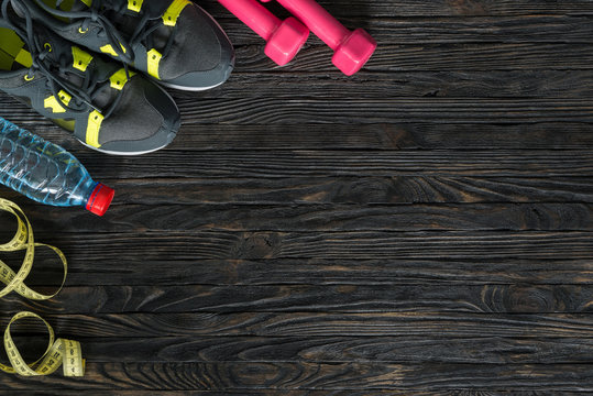 Sport Fitness Items On Dark Wooden Background