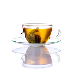 Yellow Tea with bag in Glass Cup