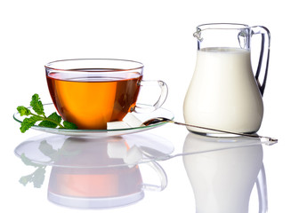 Tea Cup and Milk Isolated on White