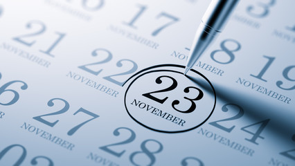 November 23 written on a calendar to remind you an important app