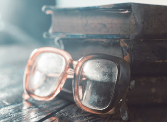 Reading concept (selective focus on the near side glasses)