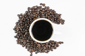 cup with coffee beans, isolated on white background