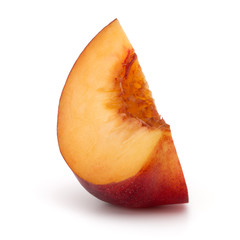 Nectarine fruit slice isolated on white background close up
