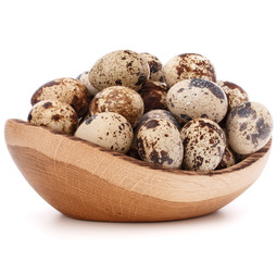 quail eggs in wooden bowl isolated on white background cutout