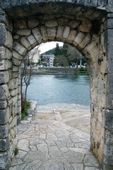 Fototapeta na wymiar Arched gate in the old town of Trebinje