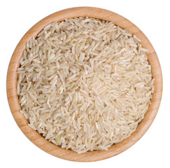  Top view raw brown rice in a wooden bowl isolated